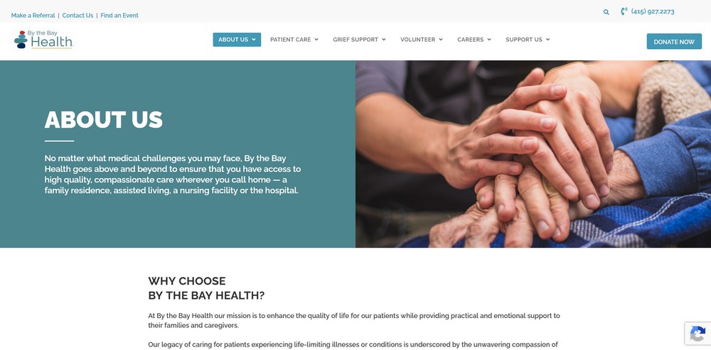 Two people holding hands, one elderly, on a websites About Us page for By the Bay Health hospice care.