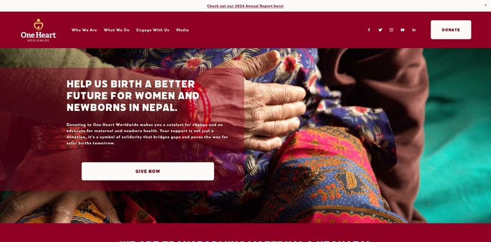 A close-up of a woman in colorful clothing with hands on her lap, promoting support for women in Nepal.